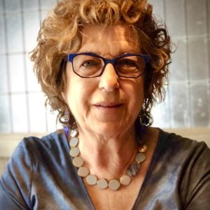 Students writing haiku at a community program session